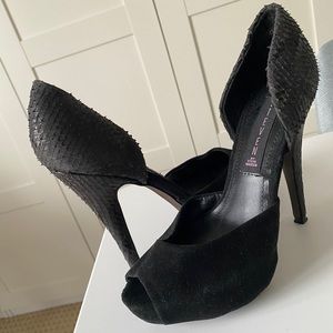 Steve Madden black platform heels.